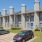 a building with cars parked in front