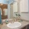a bathroom with a marble countertop