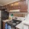 a kitchen with wooden cabinets
